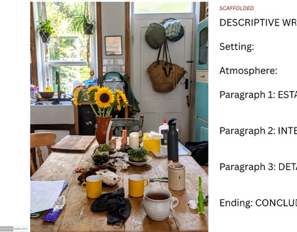 A rustic wooden dining table in a cozy kitchen setting, styled with yellow mugs, a vase of sunflowers, candles, and small plants. The right side of the image features a text template with the heading 'SCAFOLED' and prompt lines for descriptive writing.